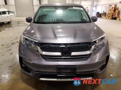 Piąte zdjęcie samochodu w środku: 2021 HONDA PILOT EXL VIN:5FNYF6H57MB022878 - miniatura