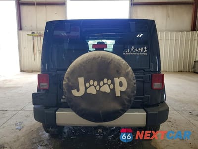 Zdjęcie 6 z 12 samochodu: 2013 JEEP WRANGLER UNLIMITED SAHARA VIN:1C4BJWEG3DL585465 - miniatura