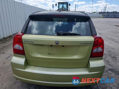 Zdjęcie 6 z 12 samochodu: 2010 DODGE CALIBER MAINSTREET VIN:1B3CB3HA9AD568099 - miniatura
