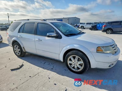 Czwarte zdjęcie samochodu z boku: 2008 FORD TAURUS X LIMITED VIN:1FMDK03W68GA10400 - miniatura