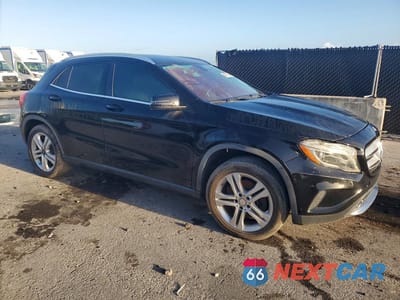 Czwarte zdjęcie samochodu z boku: 2015 MERCEDES-BENZ GLA 250 4MATIC VIN:WDCTG4GB4FJ178353 - miniatura