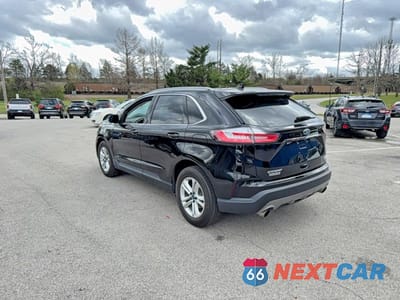 Trzecie zdjęcie samochodu z tyłu: 2020 FORD EDGE SEL VIN:2FMPK4J90LBA21619 - miniatura
