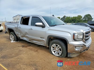 Czwarte zdjęcie samochodu z boku: 2018 GMC SIERRA K1500 SLT VIN:3GTU2NEJ8JG344909 - miniatura