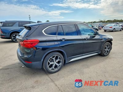 Trzecie zdjęcie samochodu z tyłu: 2019 BMW X1 XDRIVE28I VIN:WBXHT3C5XK5L91007 - miniatura