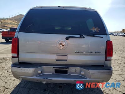 Zdjęcie 6 z 13 samochodu: 2004 CADILLAC ESCALADE ESV VIN:3GYFK66N24G232444 - miniatura
