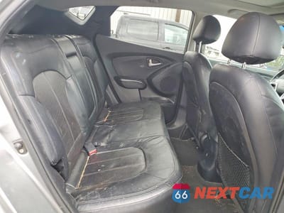 Zdjęcie 11 z 13 samochodu: 2013 HYUNDAI TUCSON LIMITED VIN:KM8JUCAC6DU690592 - miniatura