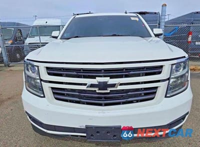 Zdjęcie 11 z 13 samochodu: 2015 CHEVROLET TAHOE K1500 LT VIN:1GNSKBKC0FR220207 - miniatura