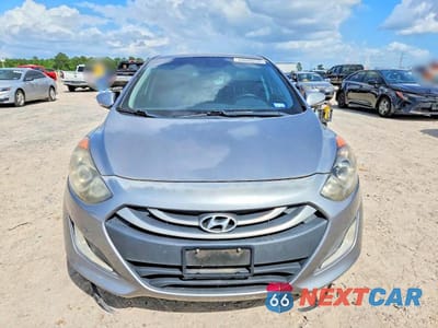 Piąte zdjęcie samochodu w środku: 2014 HYUNDAI ELANTRA GT BASE VIN:KMHD35LH0EU165307 - miniatura