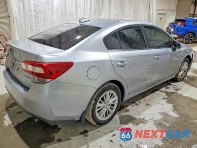 Trzecie zdjęcie samochodu z tyłu: 2017 SUBARU IMPREZA PREMIUM PLUS VIN:4S3GKAD66H3625753 - miniatura