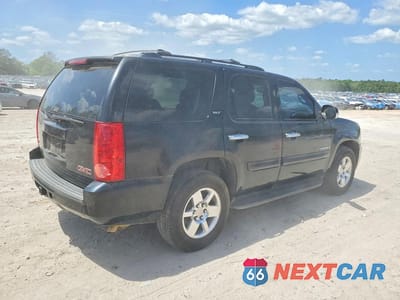 Trzecie zdjęcie samochodu z tyłu: 2009 GMC YUKON SLT VIN:1GKEC33329R220211 - miniatura