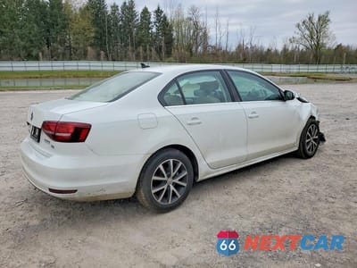 Trzecie zdjęcie samochodu z tyłu: 2018 VOLKSWAGEN JETTA SE VIN:3VWDB7AJ8JM213317 - miniatura