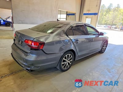 Trzecie zdjęcie samochodu z tyłu: 2017 VOLKSWAGEN JETTA SE VIN:3VWDB7AJ1HM372576 - miniatura