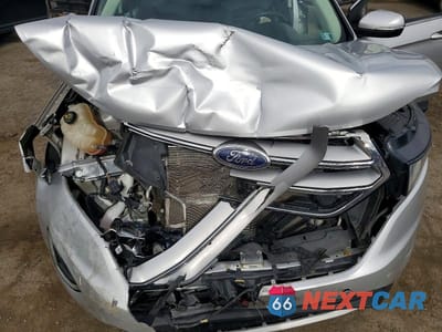 Zdjęcie 12 z 13 samochodu: 2016 FORD EDGE SEL VIN:2FMPK3J9XGBC49076 - miniatura