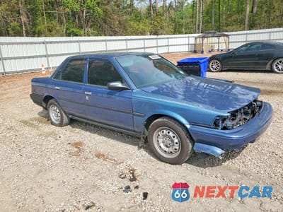 Czwarte zdjęcie samochodu z boku: 1991 TOYOTA CAMRY BASE VIN:JT2SV24E1M3432623 - miniatura