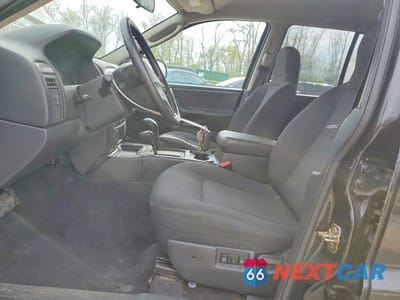 Zdjęcie 7 z 14 samochodu: 2004 JEEP GRAND CHEROKEE LAREDO VIN:1J4GW48S34C340980 - miniatura