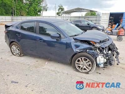 Czwarte zdjęcie samochodu z boku: 2017 TOYOTA YARIS IA BASE VIN:3MYDLBYV1HY156491 - miniatura