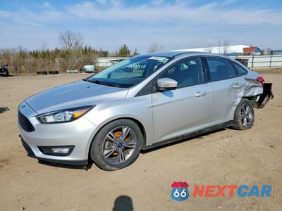 2018 FORD FOCUS SE 1FADP3FE8JL210269 - główne zdjęcie licytacji z USA - miniatura