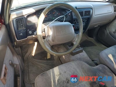 Zdjęcie 8 z 12 samochodu: 1999 TOYOTA TACOMA BASE VIN:4TAVL52N2XZ495046 - miniatura