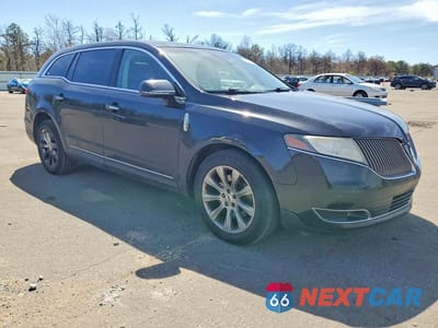Czwarte zdjęcie samochodu z boku: 2013 LINCOLN MKT VIN:2LMHJ5FK8DBL54018 - miniatura
