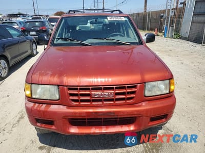 Piąte zdjęcie samochodu w środku: 1999 ISUZU RODEO S VIN:4S2CK58W0X4347784 - miniatura
