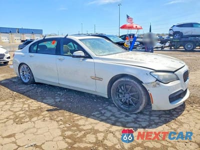 Czwarte zdjęcie samochodu z boku: 2013 BMW 740 LXI VIN:WBAYF4C54DD281523 - miniatura