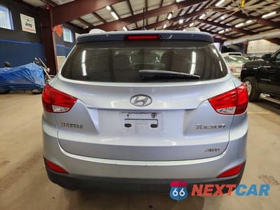 Zdjęcie 6 z 13 samochodu: 2011 HYUNDAI TUCSON GLS VIN:KM8JUCAC7BU212579 - miniatura