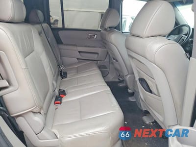 Zdjęcie 11 z 13 samochodu: 2011 HONDA PILOT EXL VIN:5FNYF4H54BB033998 - miniatura