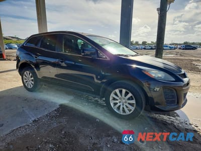 Czwarte zdjęcie samochodu z boku: 2011 MAZDA CX-7 VIN:JM3ER2B59B0398593 - miniatura