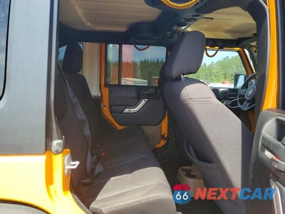 Zdjęcie 10 z 12 samochodu: 2013 JEEP WRANGLER UNLIMITED SAHARA VIN:1C4BJWEG9DL557847 - miniatura
