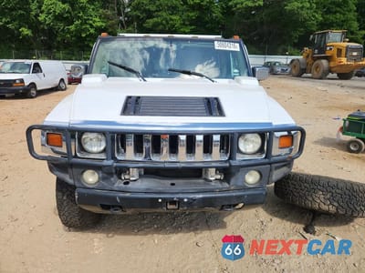 Piąte zdjęcie samochodu w środku: 2003 HUMMER H2 VIN:5GRGN23U43H130412 - miniatura