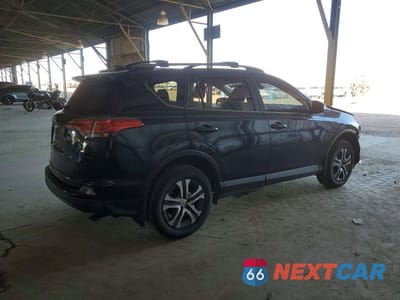 Trzecie zdjęcie samochodu z tyłu: 2018 TOYOTA RAV4 LE VIN:JTMZFREV1JJ749805 - miniatura