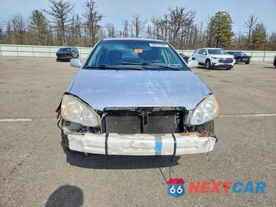Piąte zdjęcie samochodu w środku: 2003 TOYOTA COROLLA LE VIN:2T1BR32E13C000656 - miniatura