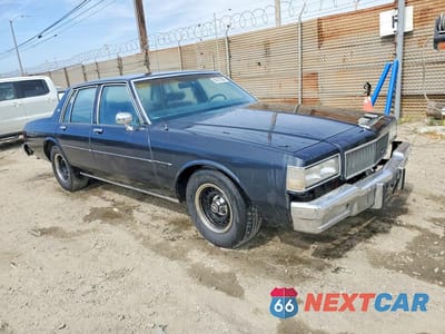 Czwarte zdjęcie samochodu z boku: 1989 CHEVROLET CAPRICE VIN:1G1BL5177KR232207 - miniatura