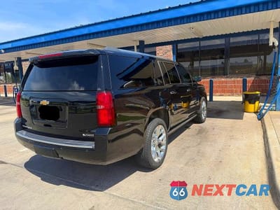 Czwarte zdjęcie samochodu z boku: 2018 CHEVROLET SUBURBAN K1500 PREMIER VIN:1GNSKJKC5JR172013 - miniatura