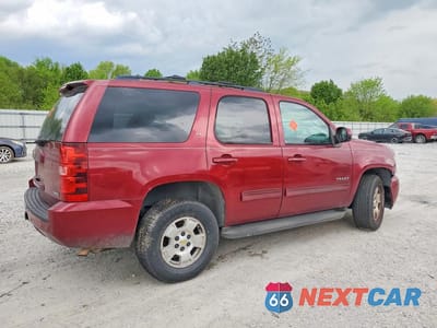 Trzecie zdjęcie samochodu z tyłu: 2010 CHEVROLET TAHOE K1500 LT VIN:1GNUKBE03AR123456 - miniatura