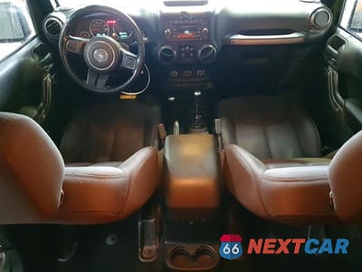Zdjęcie 8 z 14 samochodu: 2015 JEEP WRANGLER UNLIMITED SPORT VIN:1C4BJWDG6FL586243 - miniatura