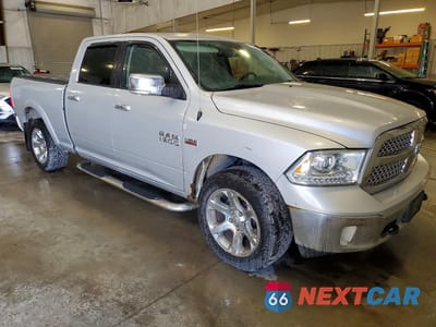 Czwarte zdjęcie samochodu z boku: 2014 RAM 1500 LARAMIE VIN:1C6RR7VT2ES406437 - miniatura