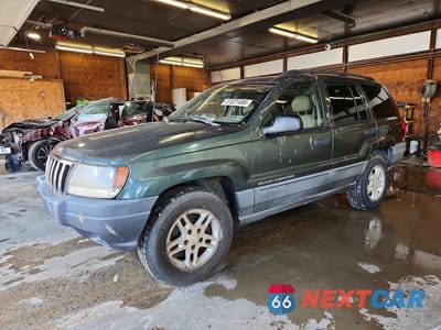 2002 JEEP GRAND CHEROKEE LAREDO 1J4GW48SX2C232806 - główne zdjęcie licytacji z USA - miniatura
