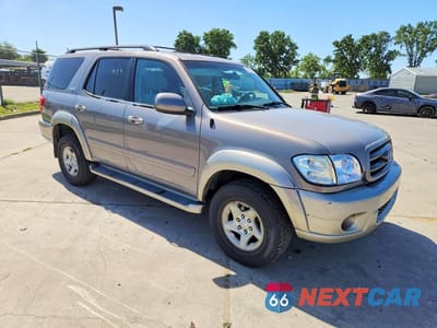 Czwarte zdjęcie samochodu z boku: 2001 TOYOTA SEQUOIA SR5 VIN:5TDBT44A91S025729 - miniatura