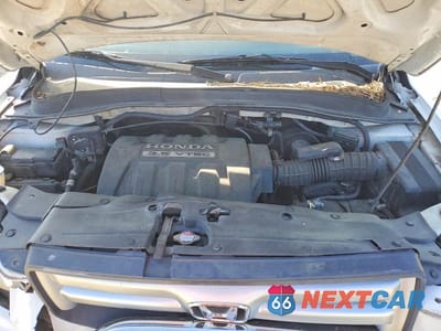 Zdjęcie 12 z 12 samochodu: 2007 HONDA PILOT EXL VIN:2HKYF185X7H531663 - miniatura