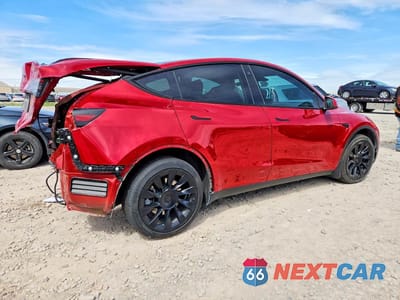 Trzecie zdjęcie samochodu z tyłu: 2023 TESLA MODEL Y VIN:7SAYGDEE8PA098846 - miniatura