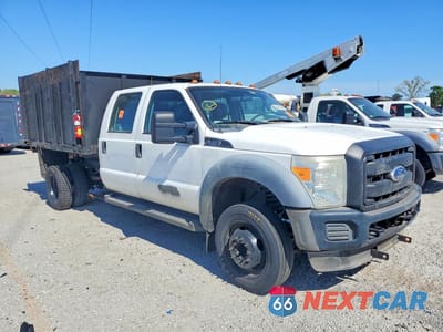 Czwarte zdjęcie samochodu z boku: 2011 FORD F450 SUPER DUTY FLATBED TRUCK VIN:1FDAW4GY3BEB77701 - miniatura