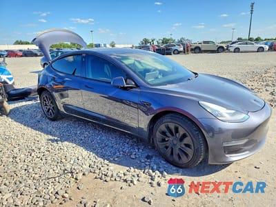 Czwarte zdjęcie samochodu z boku: 2020 TESLA MODEL 3 VIN:5YJ3E1EA3LF590304 - miniatura