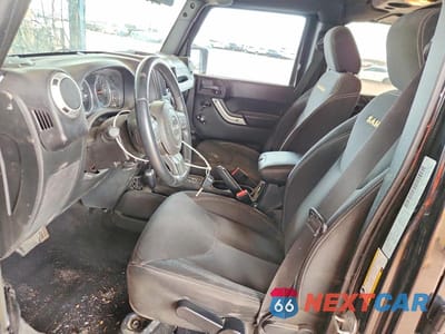 Zdjęcie 7 z 12 samochodu: 2015 JEEP WRANGLER UNLIMITED SAHARA VIN:1C4BJWEG2FL647330 - miniatura