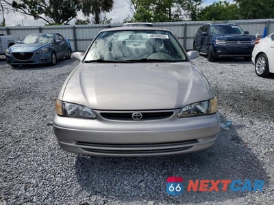 Piąte zdjęcie samochodu w środku: 2000 TOYOTA COROLLA VE VIN:2T1BR12E2YC302209 - miniatura