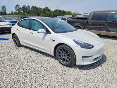 Czwarte zdjęcie samochodu z boku: 2021 TESLA MODEL 3 VIN:5YJ3E1EA1MF853617 - miniatura