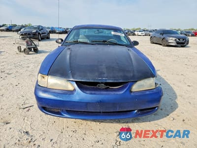Piąte zdjęcie samochodu w środku: 1997 FORD MUSTANG VIN:1FALP404XVF207704 - miniatura