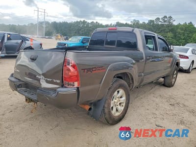 Trzecie zdjęcie samochodu z tyłu: 2015 TOYOTA TACOMA DOUBLE CAB PRERUNNER LONG BED VIN:5TFKU4HN1FX007219 - miniatura