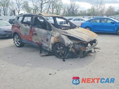 Czwarte zdjęcie samochodu z boku: 2016 FORD ESCAPE TITANIUM VIN:1FMCU0JX4GUB11775 - miniatura