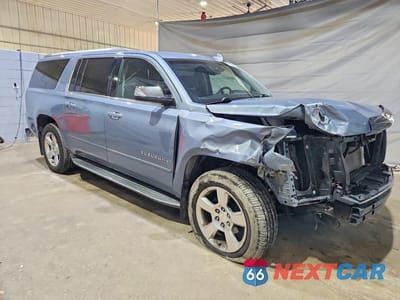 Czwarte zdjęcie samochodu z boku: 2016 CHEVROLET SUBURBAN K1500 LTZ VIN:1GNSKJKC1GR101951 - miniatura